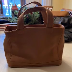 Very gently used coach bag in neutral color beige